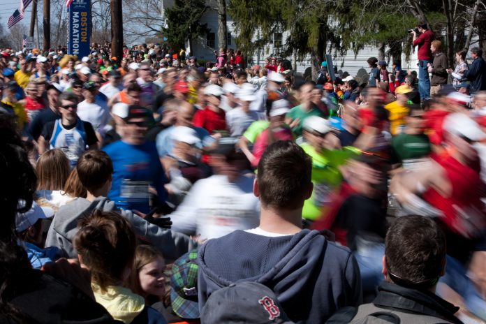 Runners start the Boston Marathon
