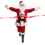 Santa Claus on the finish line of a race